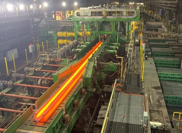 Rolling process incandescent metal side view