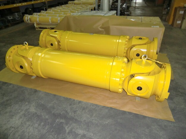 Pair of yellow EPR cardan shafts on pallet